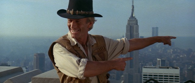 In "'Crocodile' Dundee", Australian outdoorsman Michael Dundee (Paul Hogan) journeys to New York City for the first time and poses for pictures on the Empire State Building's Observation Deck.