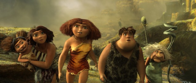 Sandy, Ugga, Eep, Thunk, and Gran are surprised to find Grug and Guy working together in "The Croods."