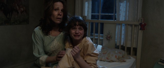 The new house is not treating Carolyn Perron (Lili Taylor) and her daughter (Joey King) well.