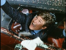 Dexter Reilly greets confetti-throwers in New York...