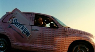 Keeping costs down on this road trip is the pink vehicle paid for by Sweet'N Low.