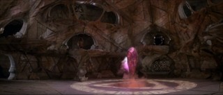 The Dark Crystal floats magically within the castle, with a fiery doom in beneath the floor.