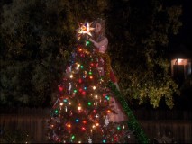 Keely lights the town Christmas tree in the never-before-aired bonus "Phil of the Future" episode.