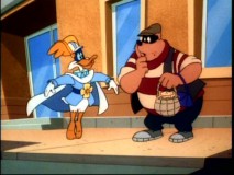 Darkwing's kinder, gentler look (complete with ballet moves) baffles crooks like this Beagle Boy.