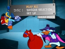 Disc One's main menu consists of Darkwing launching a sneak attack upon a rubber bouncy horse.