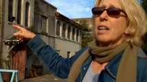 Production designer Kara Lindstrom points to the part of South Carolina that's about to hold a Hungarian cafe in "Transforming Charleston."