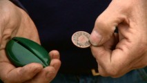 We get a look at one of the rare coins in the collection of picture car coordinator C. Benny Dietz.