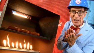 Bill Nye the Science Guy uses hot dogs cooking in ovens to explain different types of heat transfer.