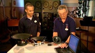 With a speaker and a laptop, Imagineer Steve Kadar shows Asa how magnetism produces sound on the Pirates of the Caribbean.