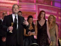 Marc Cherry accepts a Golden Globe in front of his leading ladies, as seen in the featurette "Desperate Housewives Around the World."