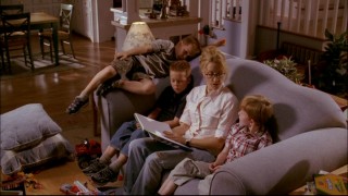 Lynette has her boys captive, but they're not as amused as when the super nanny reads to them.