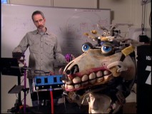 Remote puppeteer Allan Trautman demonstrates how he governs Fran's facial movements.