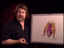 Kirk Thatcher demonstrates the original design of Ethyl as a pterodactyl.