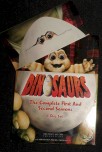 The "Dinosaurs" slipcover does not merely duplicate inside artwork.