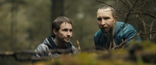 Danny (Martin Compston) and Vic (Eddie Marsan) scout out their assigned drop-off location in one of the film's few outdoor scenes.