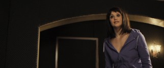 Alice (Gemma Arterton) zips up her purple sweatshirt, ending her second contribution to the nudity that includes all three of the film's actors.
