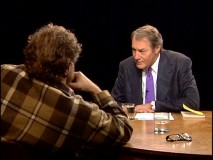 Months before a MacBook beat him up, Charlie Rose listened intently to director Julian Schnabel in a lumberjack's coat.
