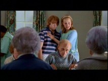 Laura (Laura Linney) proudly displays her son in the deleted scene "Old Person's Home."