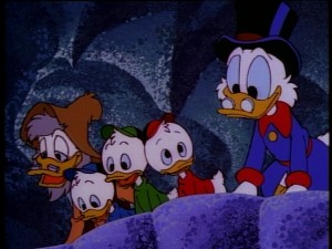 Scrooge, the nephews, and their oddball friend peer into the Fountain of Youth.