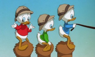 Huey, Louie, and Dewey ride on a tri-humped camel in "DuckTales: The Movie - Treasure of the Lost Lamp."