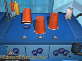 The player is asked to risk 1-3 of their ribbons. The cups will then shuffle and if the player chooses the one with the treat under it, the player get as many ribbons as they had risked.