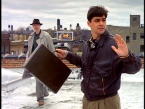 Atop the roof of a bank, Gary obeys the pilot episode's would-be robber (Tom Noonan).