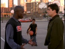 High school basketball star Michael Williams (Sharrieff Pugh) and all-knowing concerned citizen share a playground exchange in "Hoops."