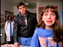 Gary looks on as his new friend (Emily Ann Lloyd) cries in the hospital-flavored episode "Faith."