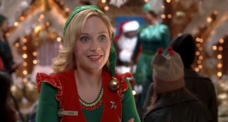 Jaded department store elf Jovie (Zooey Deschanel) assumes love interest duties.