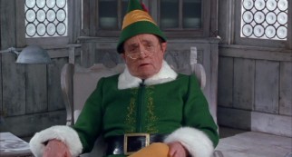 Buddy's adoptive father Papa Elf (Bob Newhart) acts as the film's storyteller.