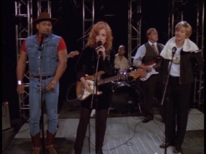 Bonnie Raitt, Aaron Neville, and Ellen DeGeneres... could there be an odder group performance?
