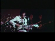 While it may not seem special to people have bought unauthorized 12-disc collections, Disc 2 provides 37 minutes of outtakes that show Elvis in footage shot for the film but unused. Here, Elvis sits, plays guitar, and sings "Little Sister" all at once.