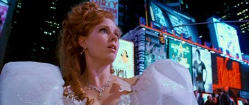 The newly-human Giselle (Amy Adams) gets her first look at our world, having just entered the middle of Manhattan through a sewer. As in many parts, the viewer can find meaning (intended or not) in several of the Times Square billboards. Mamma Mia!