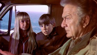 Tia and Tony try to sort things out while getting a ride in the Winnebago of Mr. O'Day (Eddie Albert, who despite his top billing doesn't show up until the halfway point).