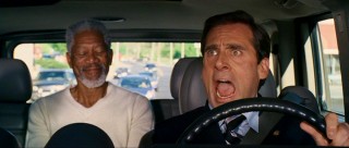 Evan Baxter (Steve Carell) is surprised to find a man claiming to be God (Morgan Freeman) instantly appearing in the backseat of his Hummer.