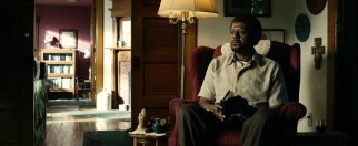 Taking refuge in his religiously-decorated living room, Barris (Forest Whitaker) still can't escape the incessant rants from his mother in the next room.