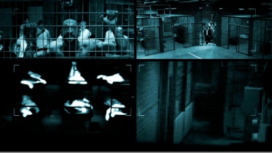 The Blu-ray Disc's main menu presents four security camera windows that each display their own footage of the prison and its inhabitants.
