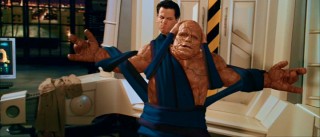 Is it clobberin' time? Not today, says Mr. Fantastic, as he and The Thing use their powers against each other.