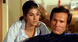 Stone-faced killer Nick Lanzetta (Henry Silva) and his unlikely love interest, don's nephew Rina (Antonia Santilli), anticipate trouble in "Il Boss" ("The Boss").