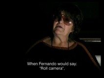 Late Italian actress Francesca Romana Coluzzi is interviewed in low light in the featurette "Roots of the Mafia."