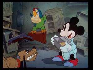 As is often the case, Mickey and Pluto have different reactions to their houseguest in "Mickey's Parrot."