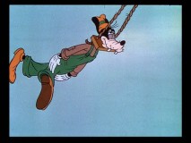 Goofy's supposed to be cleaning the clock (hence the title "Clock Cleaners"), but gets clocked himself instead.