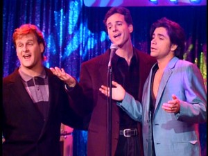 The three leading men of "Full House" (Dave Coulier, Bob Saget, and Stamos) share a song at Jesse's newly-acquired Smash Club.