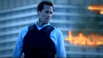 Joseph Fiennes strikes a heroic pose in a shot that seems to pay tribute to the poster and cover of "The Dark Knight", on which "FlashForward" co-creator David S. Goyer received story credit.