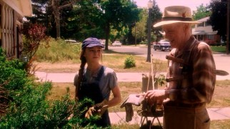 Juli (Madeline Carroll) gets some much needed landscaping assistance from Bryce's widowed grandfather Chet (John Mahoney).