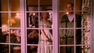 The Loski family looks at their neighbor's unkempt lawn with patriarch Steven (Anthony Edwards) offering unfriendly judgment.