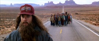 Having run back and forth across America for 3 years, 2 months, 14 days, and 16 hours, a shaggily-bearded Forrest (Tom Hanks) suddenly calls it quits in front of his inspired followers.