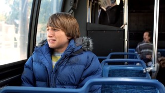 Riding the public bus by himself is an adventure in itself for Fred Frigglehorn (Lucas Cruikshank).