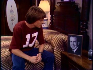 While high on speed, Alex Keaton addresses a photo of shamed Republican President Richard Nixon.