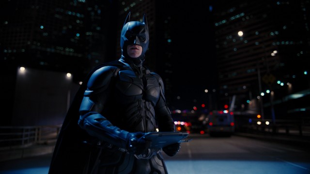 Batman is back, though he has a false reputation to live down, as Gotham's police pursue him.